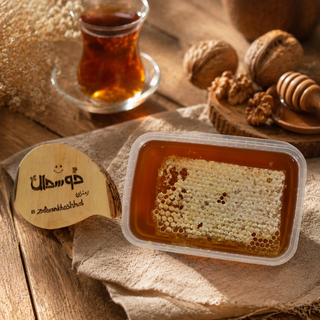 عسل چهل گیاه (یک کیلو) موم دار